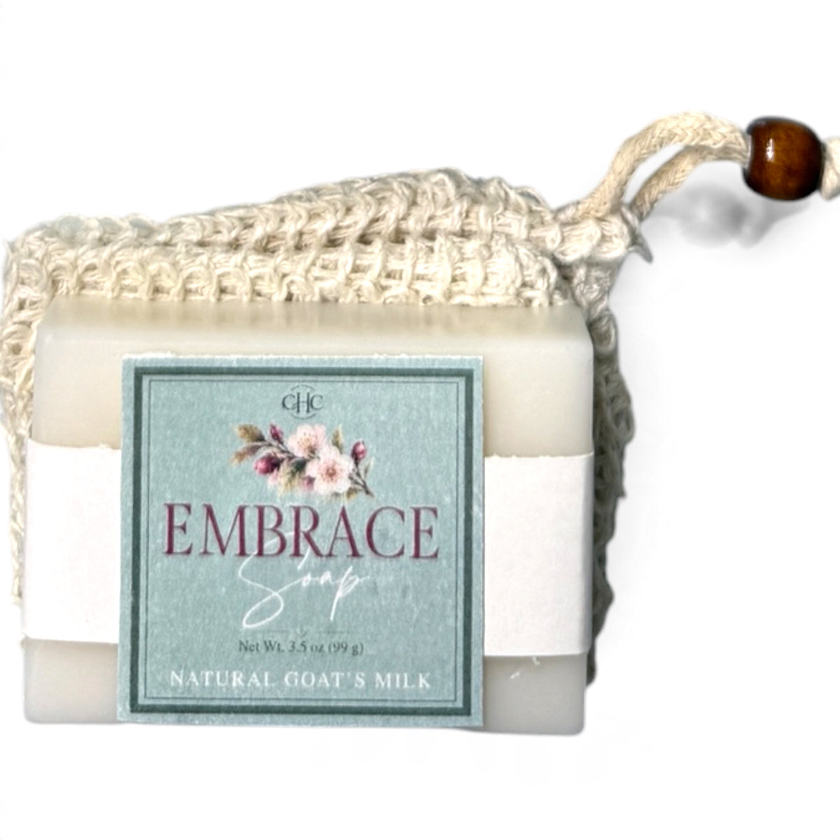 Embrace goat milk soap in Cashmere Plum tucked in its drawstring soap bag