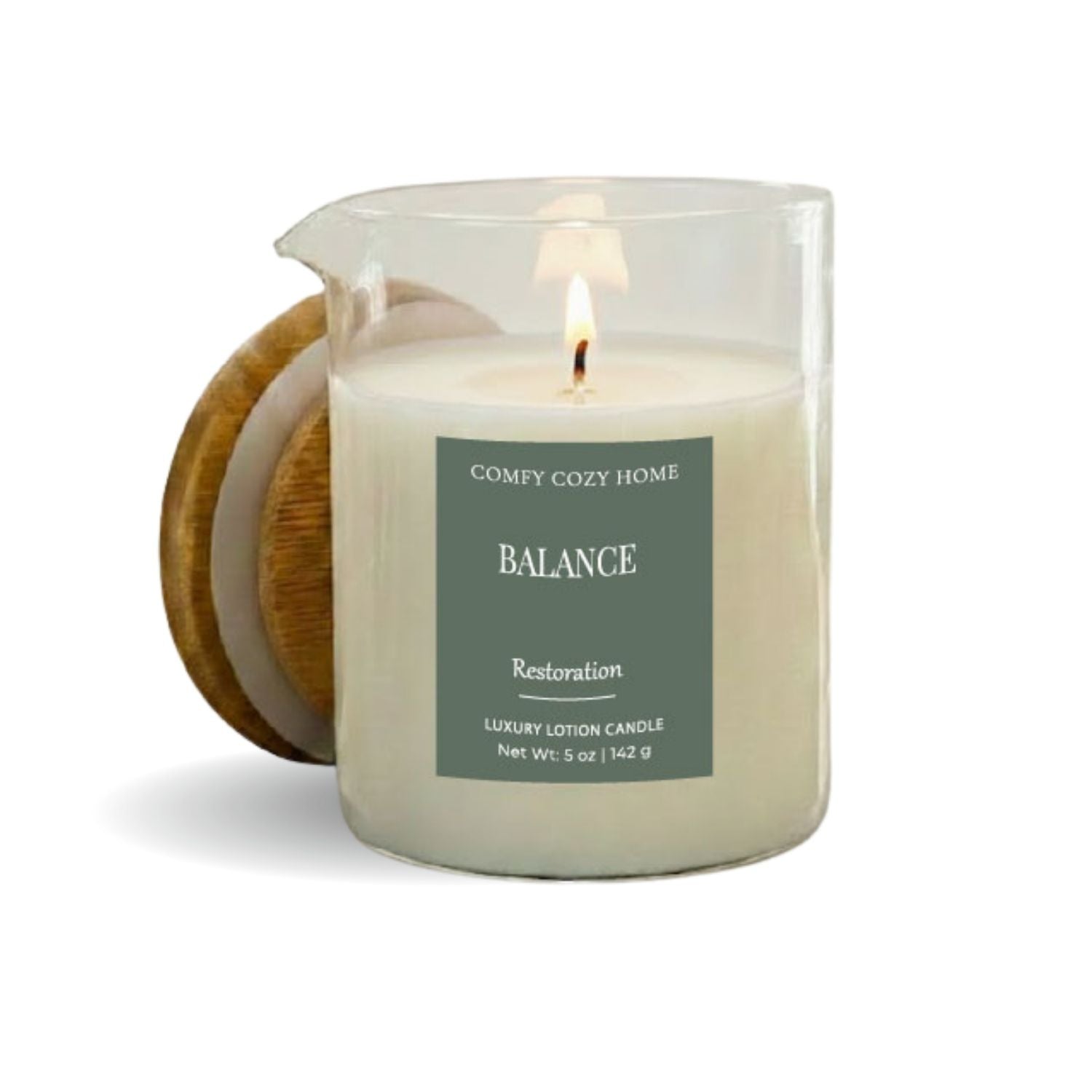 Candle in a glass jar with a wooden lid labeled 'Balance' by Comfy Cozy Home on a white background.