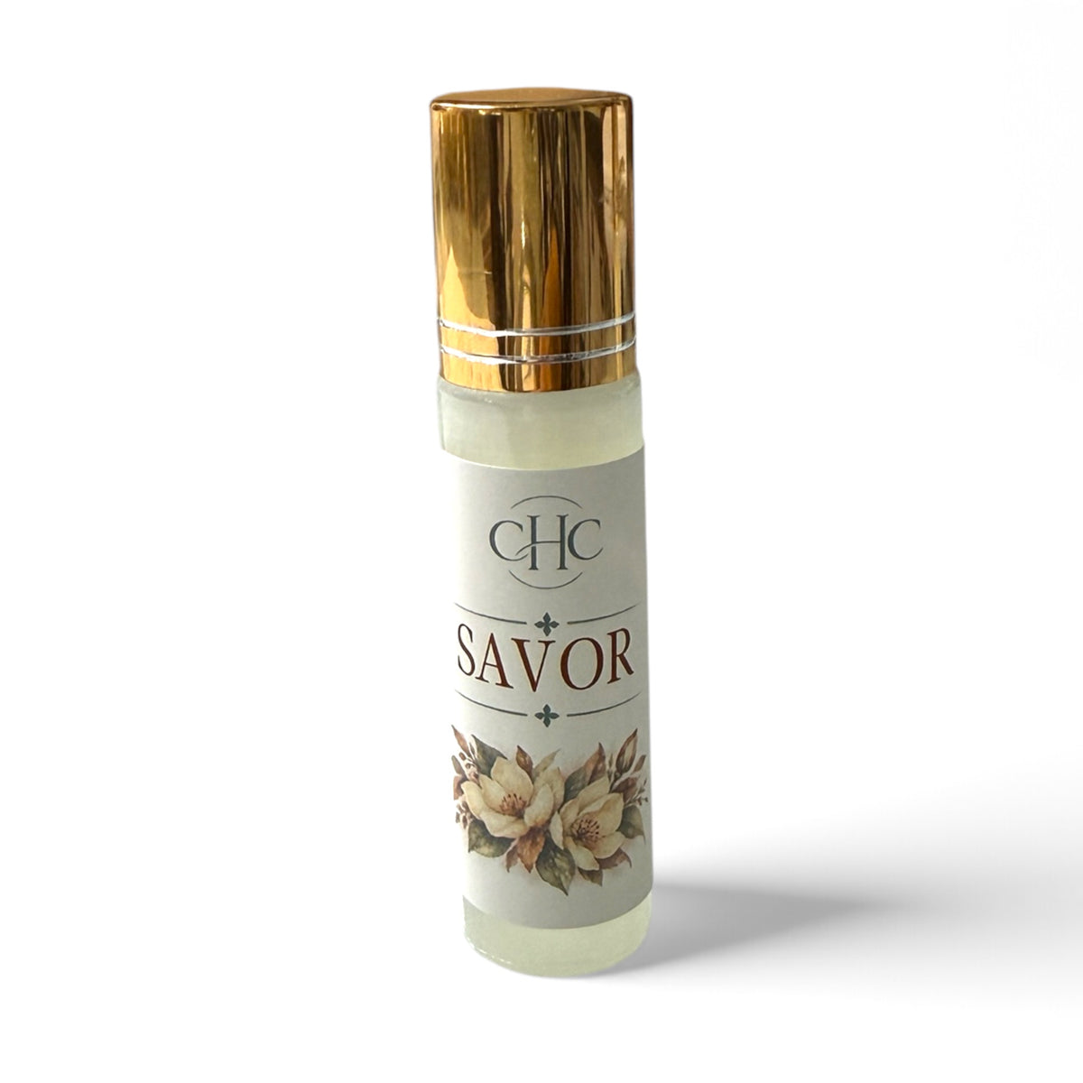 Savor roll-on perfume in Amber Noir, 10 ml glass roller bottle with a gold cap