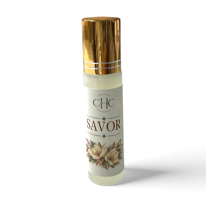 Savor roll-on perfume in Amber Noir, 10 ml glass roller bottle with a gold cap