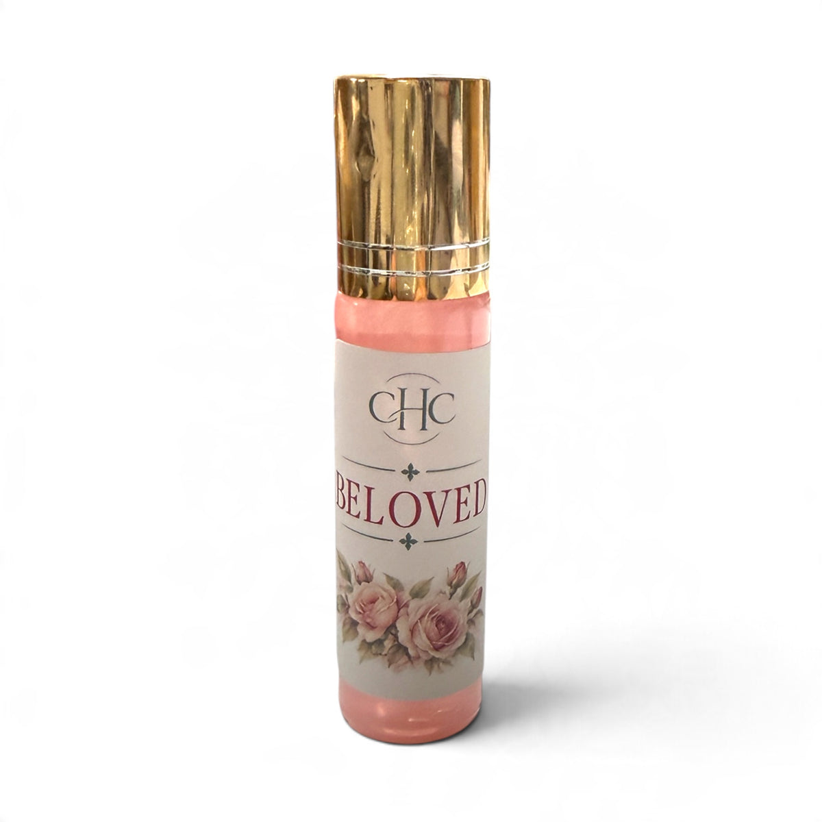 Beloved roll-on perfume in Fresh Cut Roses, 10 ml glass roller bottle with a gold cap