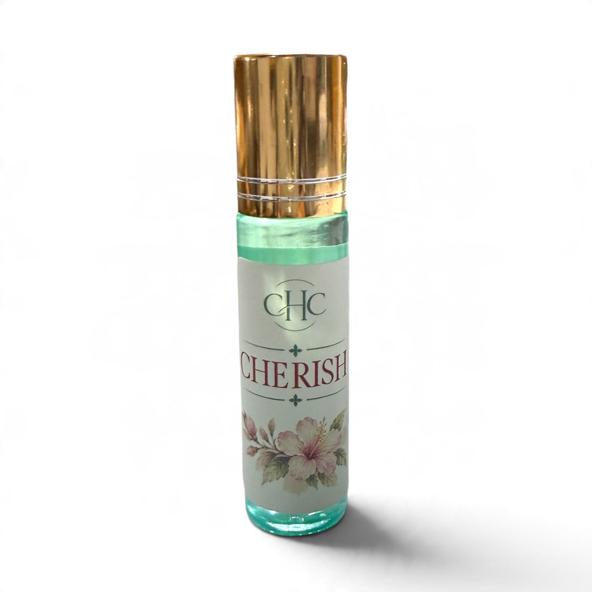 Cherish roll-on perfume in Freesia & Lilac, 10 ml glass roller bottle with a gold cap