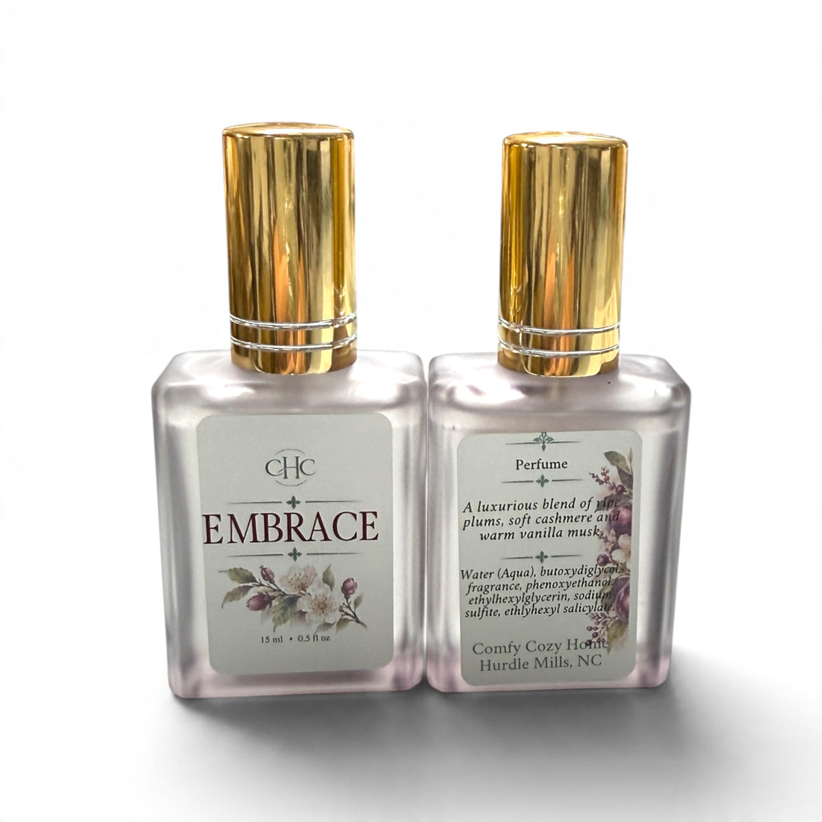 Front and back labels of the Embrace Cashmere Plum alcohol-free perfume spray bottle