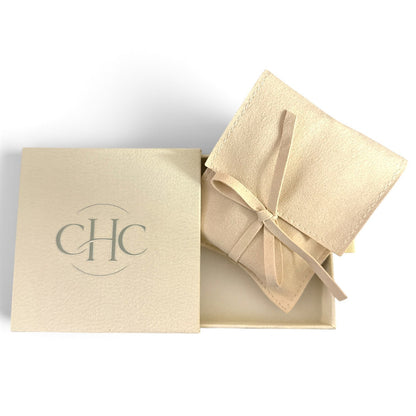 Comfy Cozy Home Nurture perfume spray gift box with a beige suede pouch tied with a ribbon